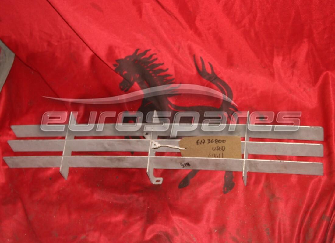 REJILLA DEL PANEL INFERIOR Ferrari USADA. NÚMERO DE PARTE 61736800 (1)