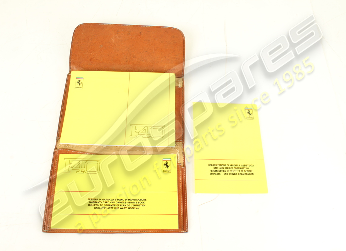 paquete de bolsa y libro ferrari f40 usado. número de parte 959908800 (7)