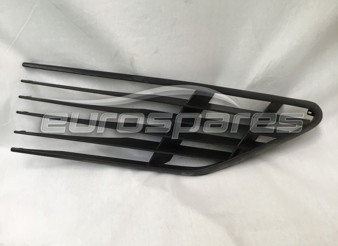 nueva rejilla de entrada lateral izquierda ferrari (plástico). número de parte 60671300 (1)