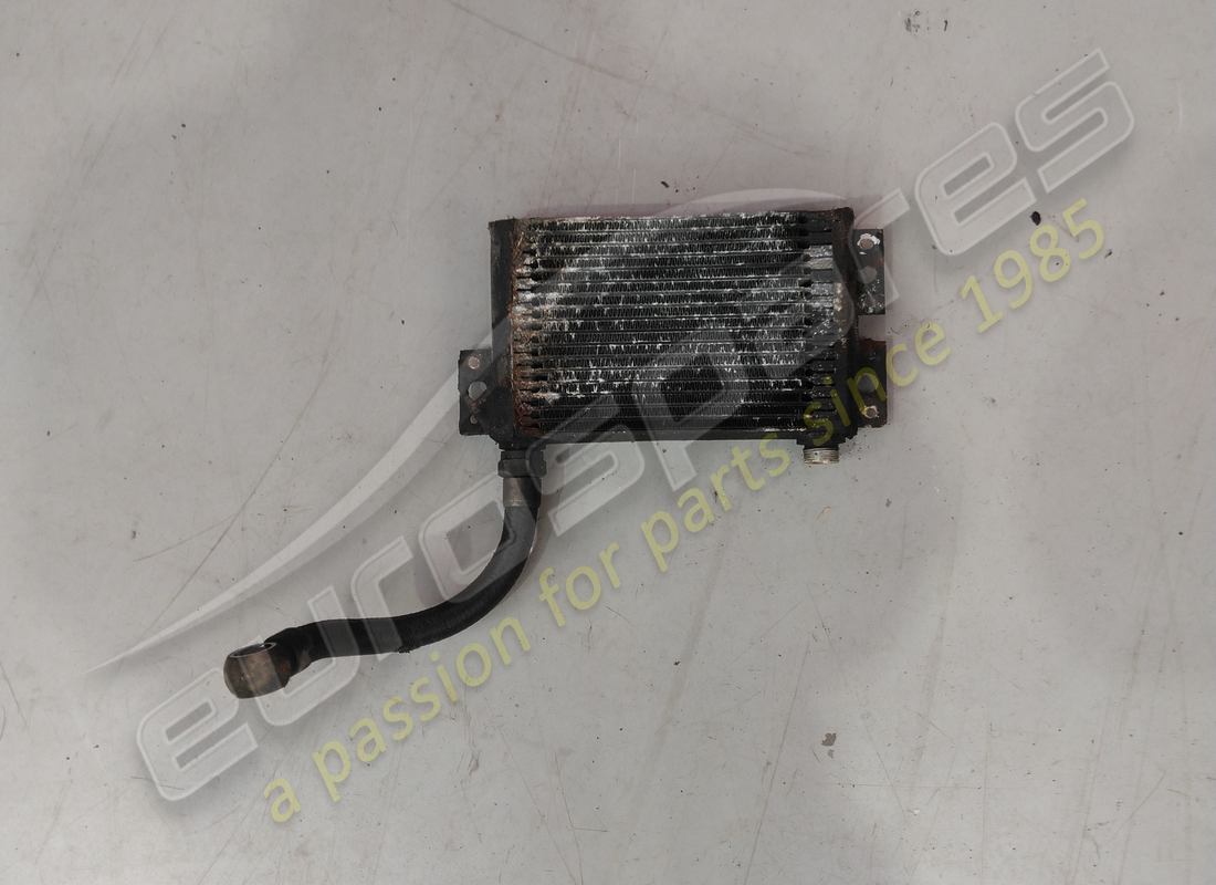 ENFRIADOR DE ACEITE Eurospares USADO CON TUBO INFERIOR. NÚMERO DE PARTE EAP1384378 (1)