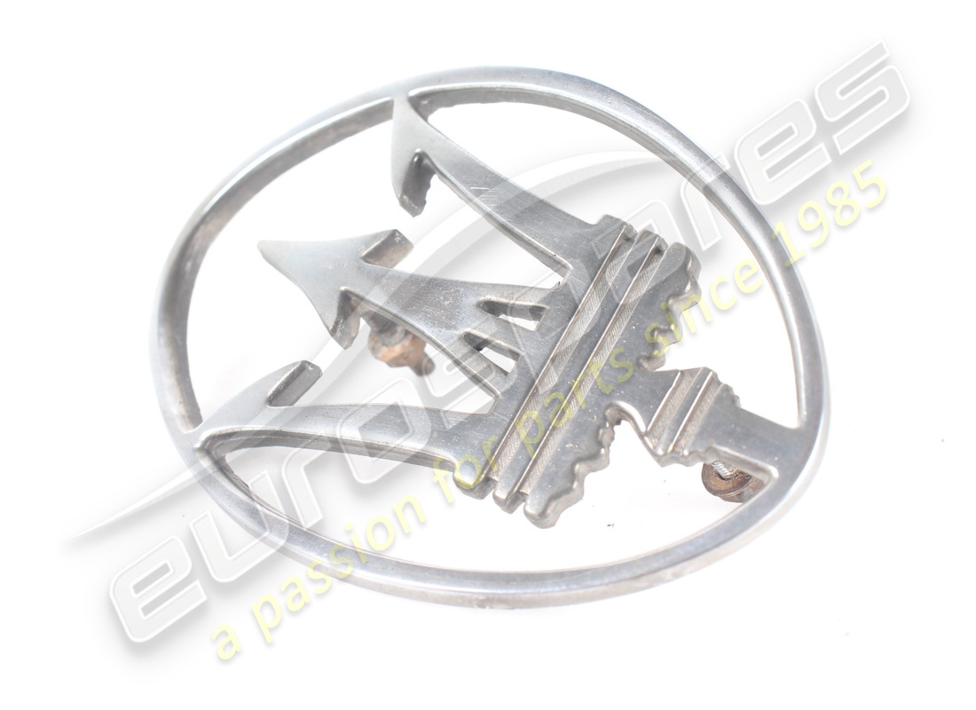 USED MASERATI SHIELD ON RADIATOR GRILL . PART NUMBER 364102304 (1)