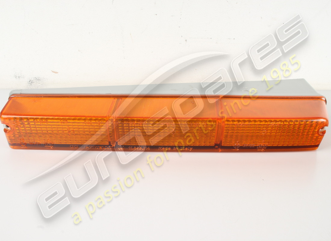 new ferrari lh front lens complete (orange/orange). part number 61942800 (1)