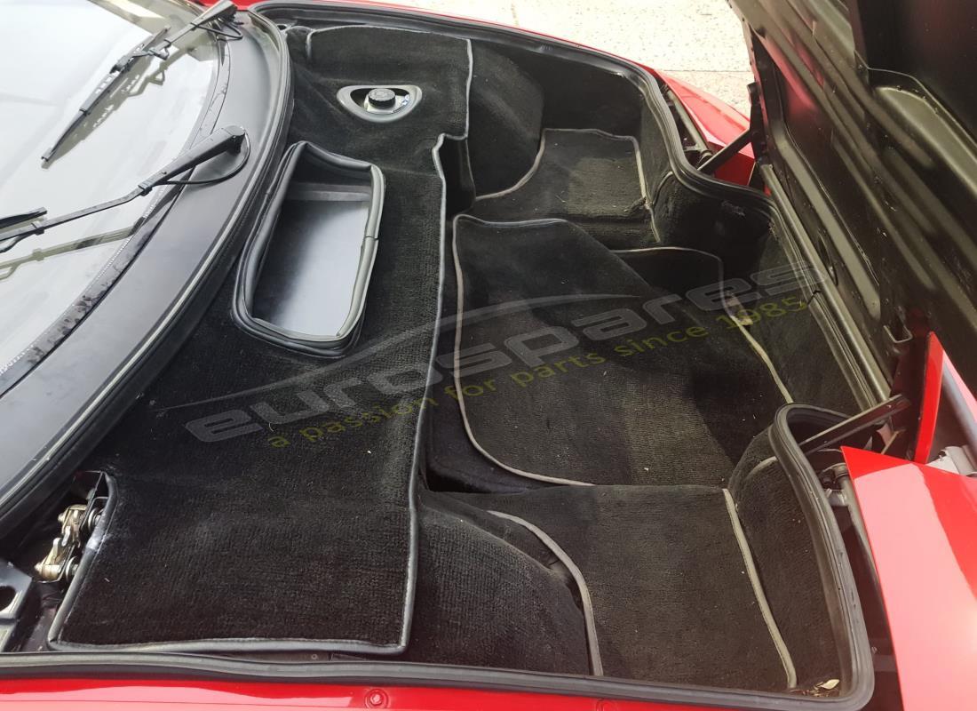 ferrari testarossa (1987) con 33,436 kilómetros, en preparación para desmantelamiento #15