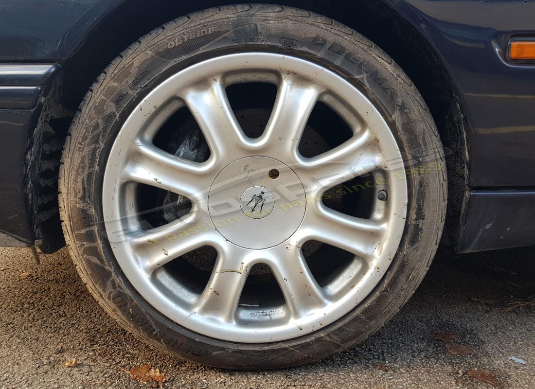 maserati qtp v6 (1996) con varios, preparándose para desmantelar #16